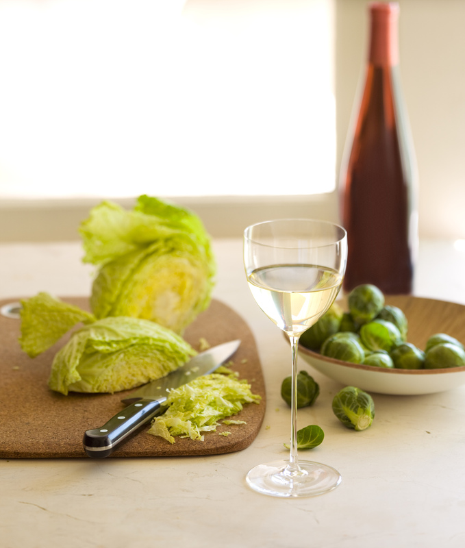 Still life with white wine and vegetables